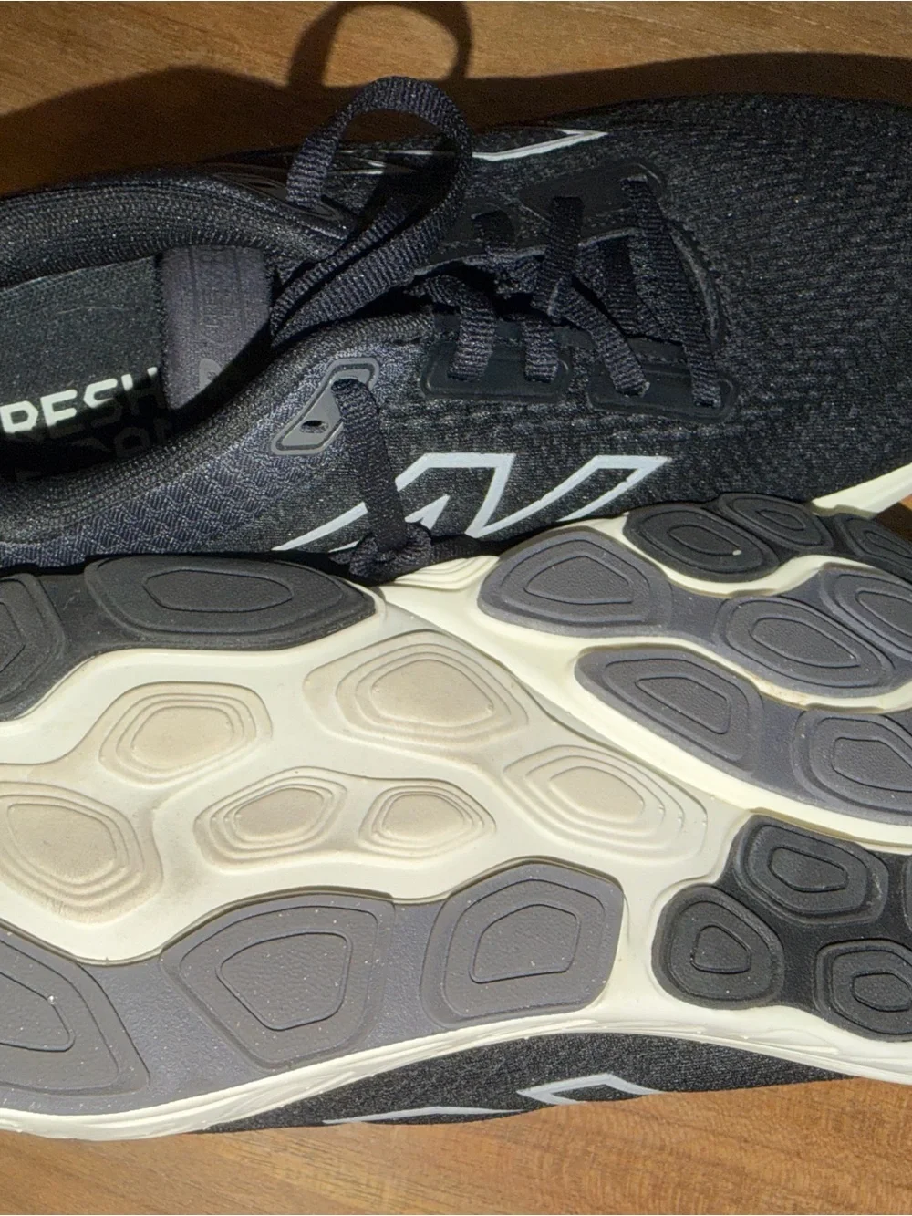 New Balance Men’s Black Athletic Shoes with White Midsole